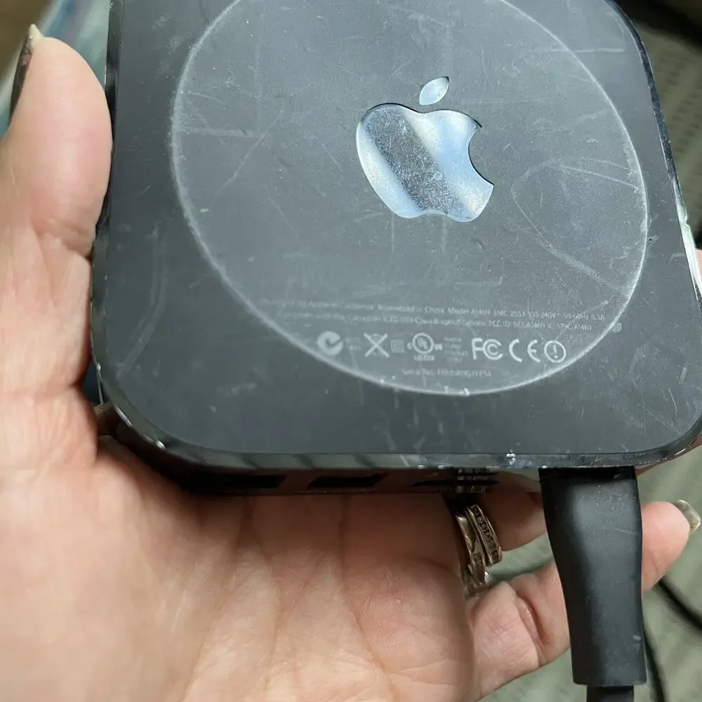 Apple TV 3rd generation HD media, model A1469, with power cable and HDMI cable